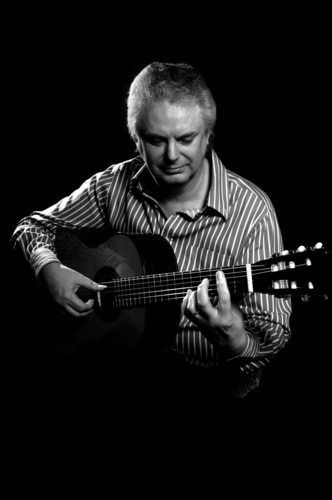 Classical Guitarist Raymond Burley playing his award winning Santos Martinez Raymond Burley signature guitar 